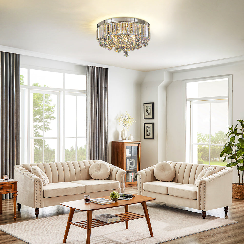 Living room with beige sofas, wooden coffee table, and decorative elements.
