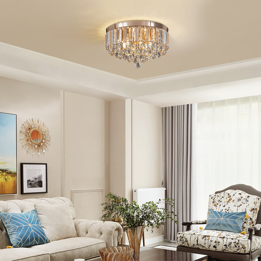 Living room with a chandelier, sofa, and armchair.