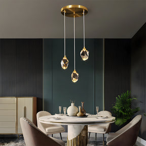 Modern dining room with a stylish pendant light fixture.
